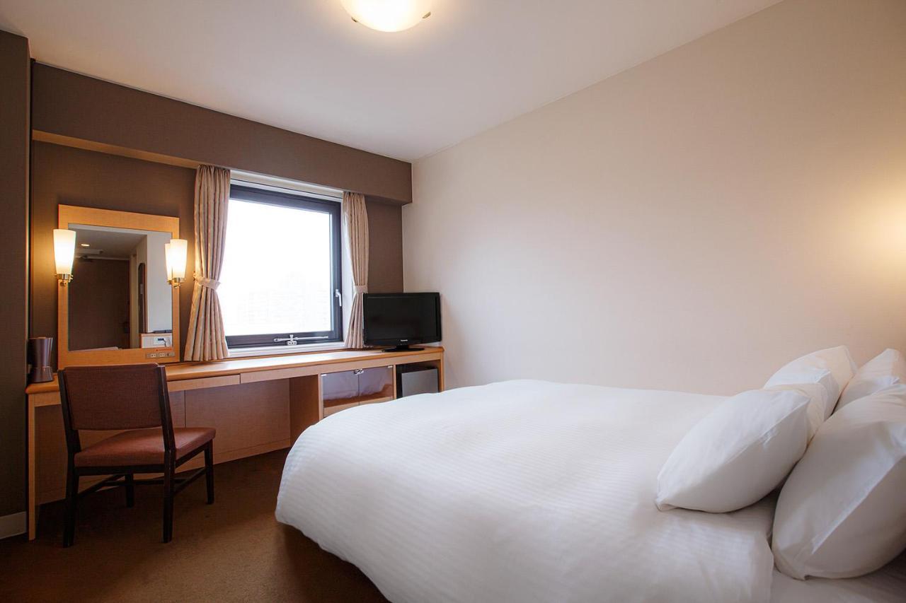 Harmonie Cinq Hotel Kitakyushu Bagian luar foto