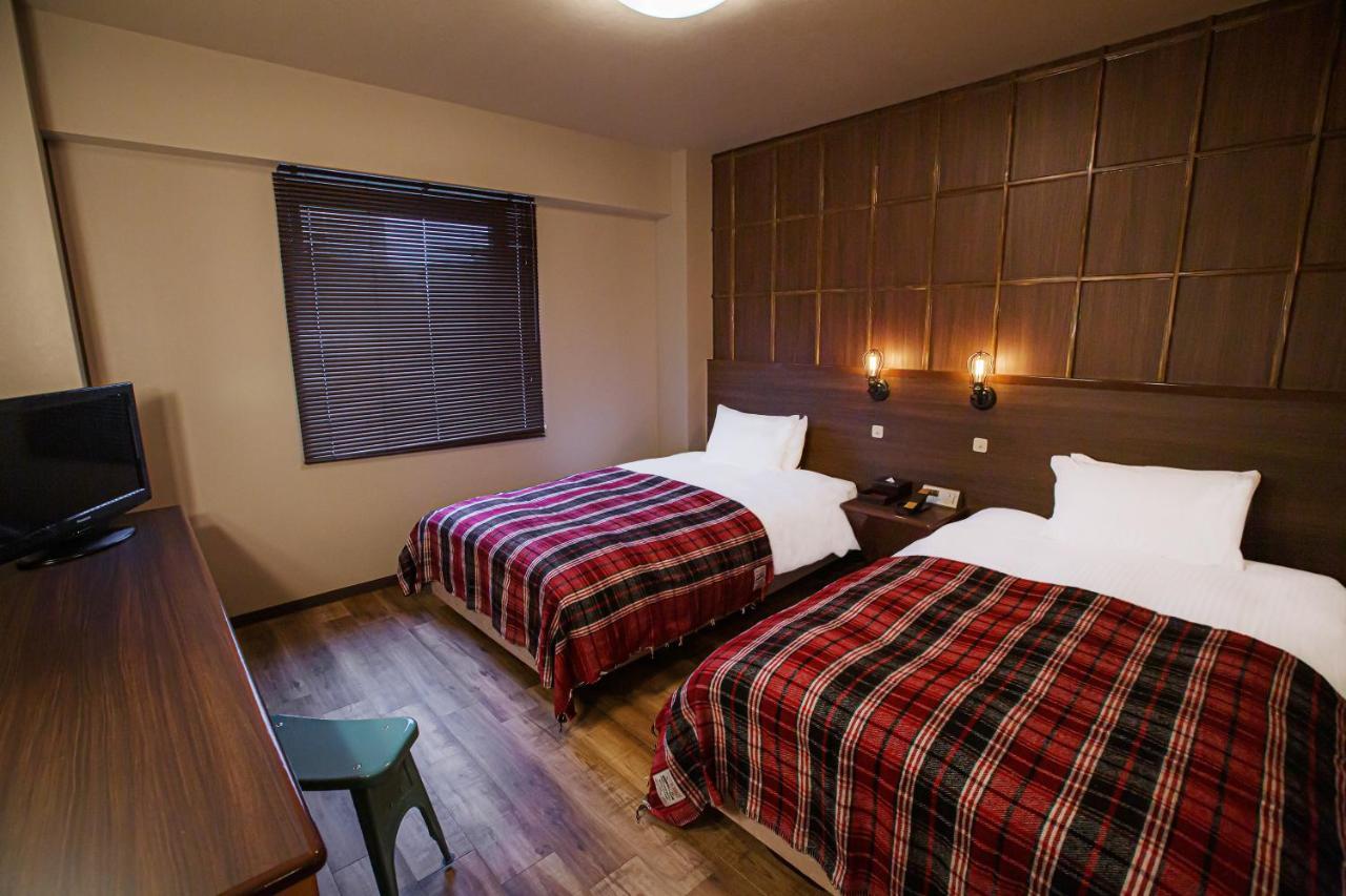 Harmonie Cinq Hotel Kitakyushu Bagian luar foto