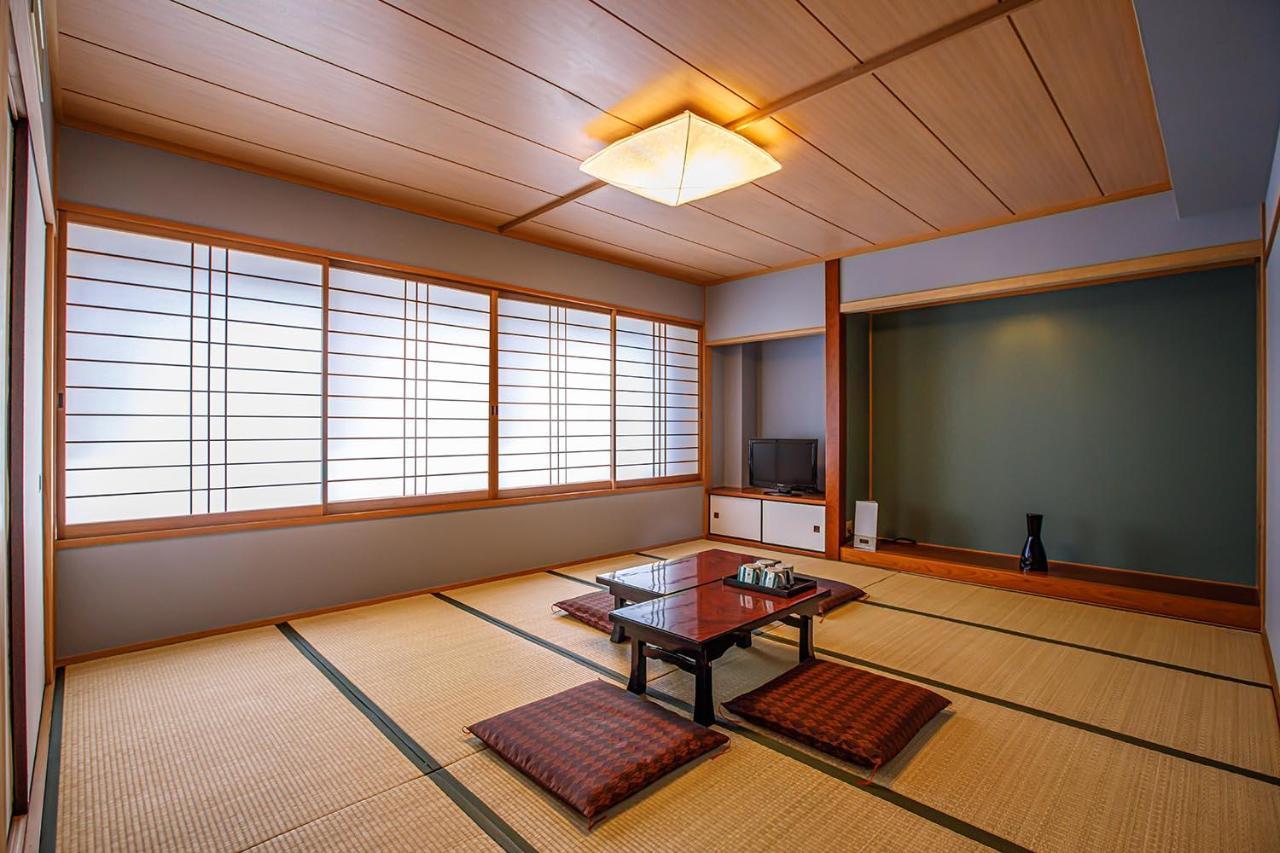 Harmonie Cinq Hotel Kitakyushu Bagian luar foto