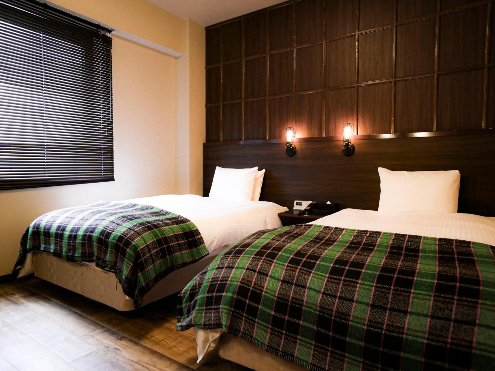 Harmonie Cinq Hotel Kitakyushu Bagian luar foto