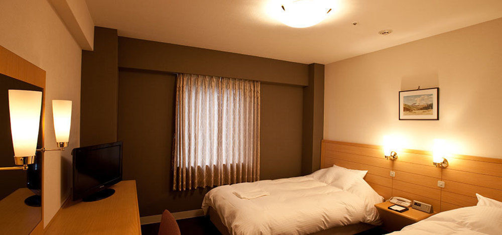 Harmonie Cinq Hotel Kitakyushu Bagian luar foto